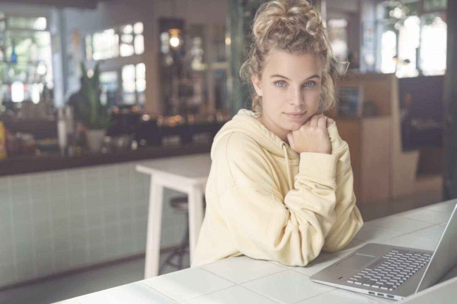 Students working on fundamental programming concepts with clear code examples on screens